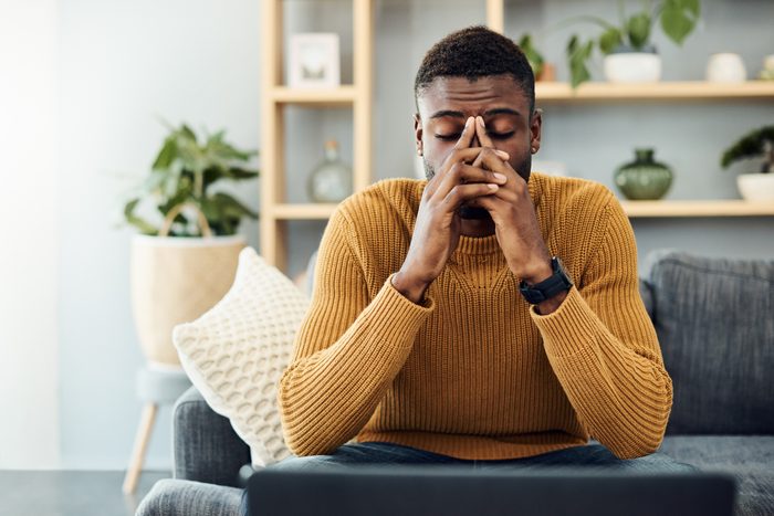 exhausted man at home
